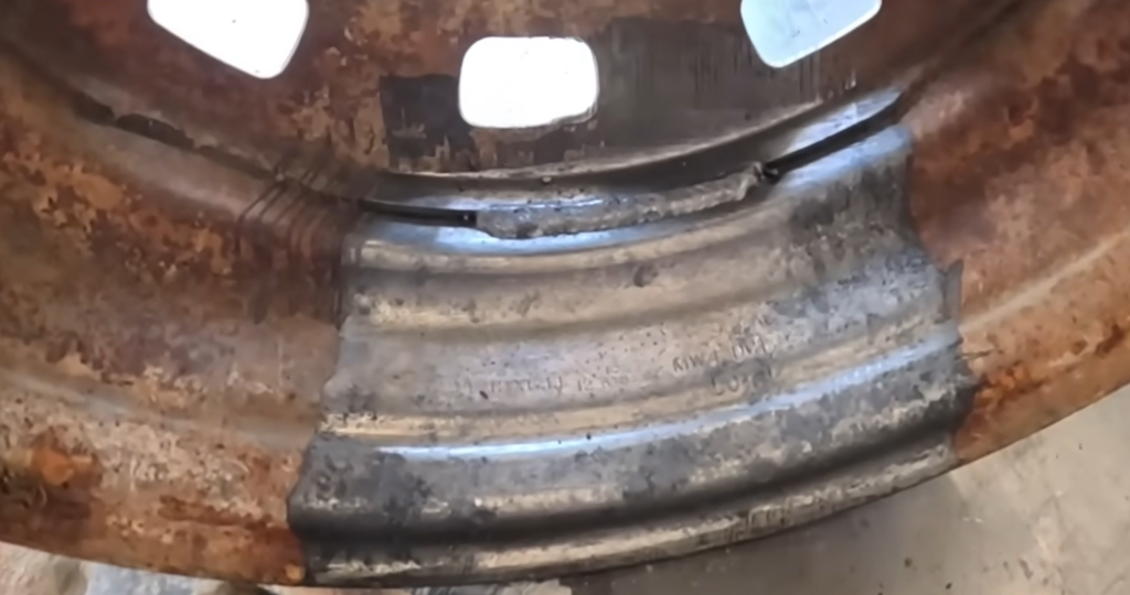 mobile laser cleaning - rusted steel wheel